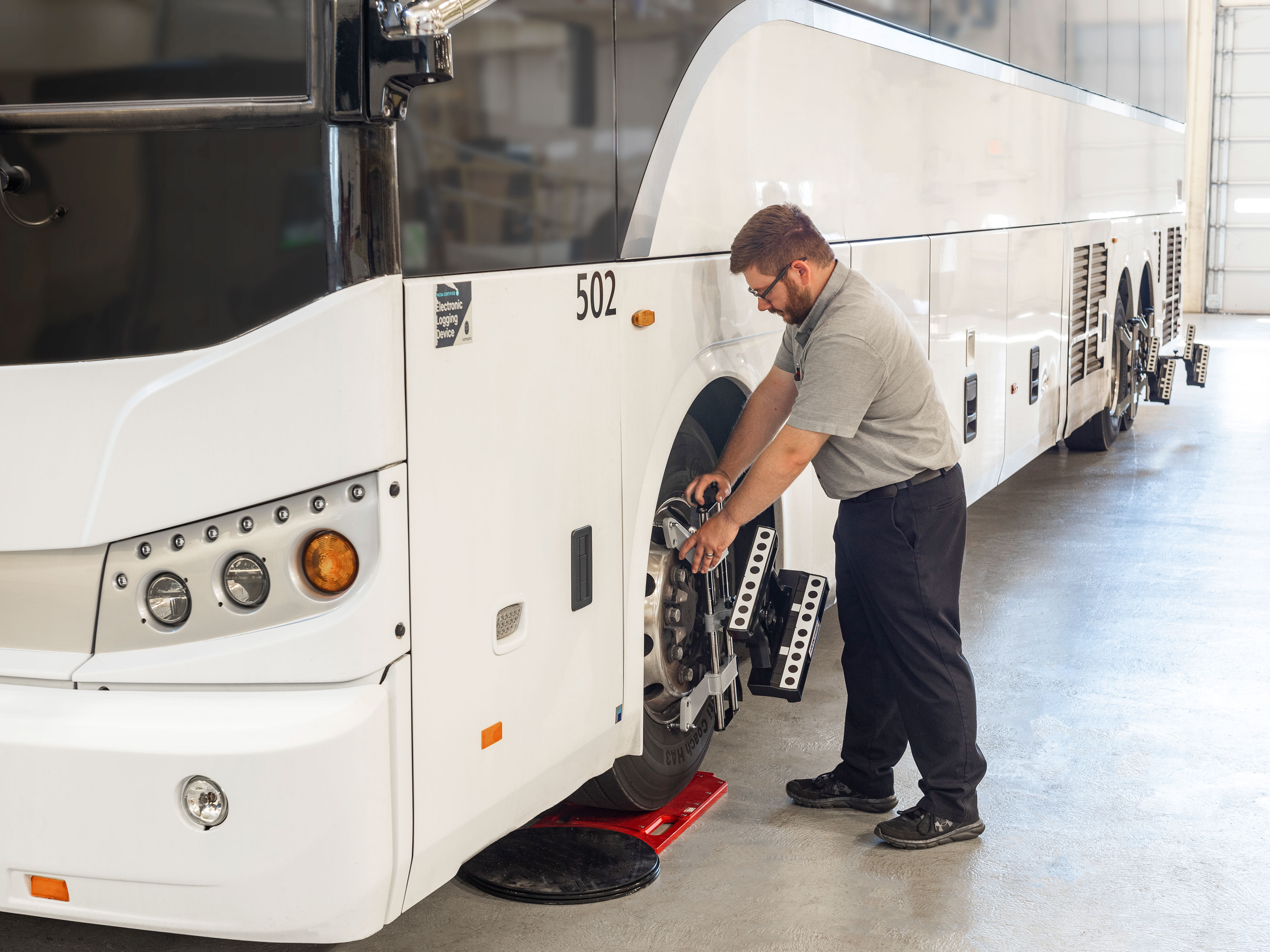 Alignements de camions et d’autobus Featured Image